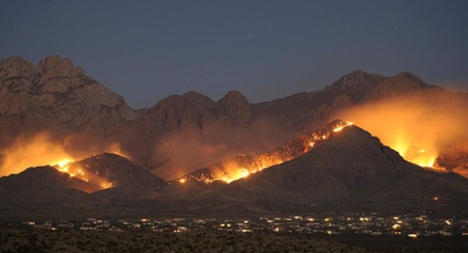 flames and smoke over mountains in New Mexico