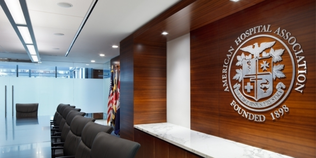 American Hospital Association seal on interior office wall