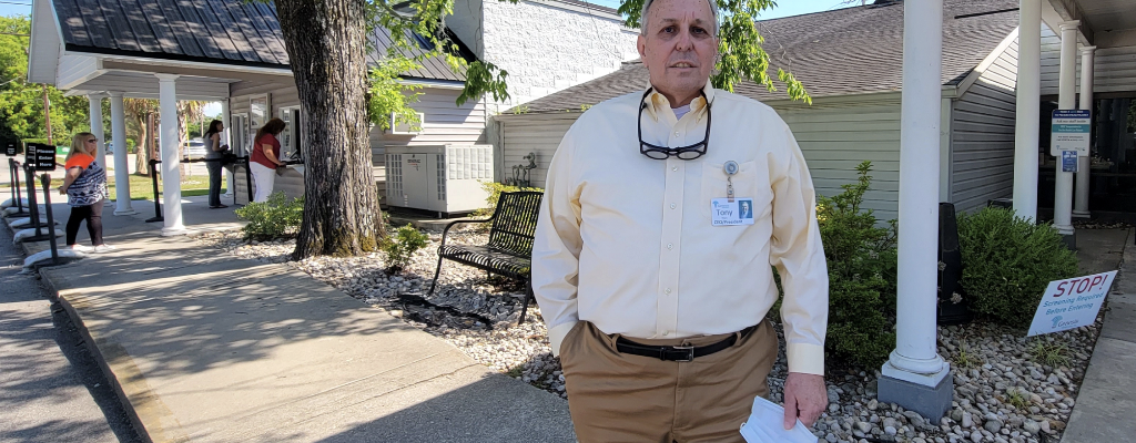 Tony Megna outside a Genesis Health Care facility