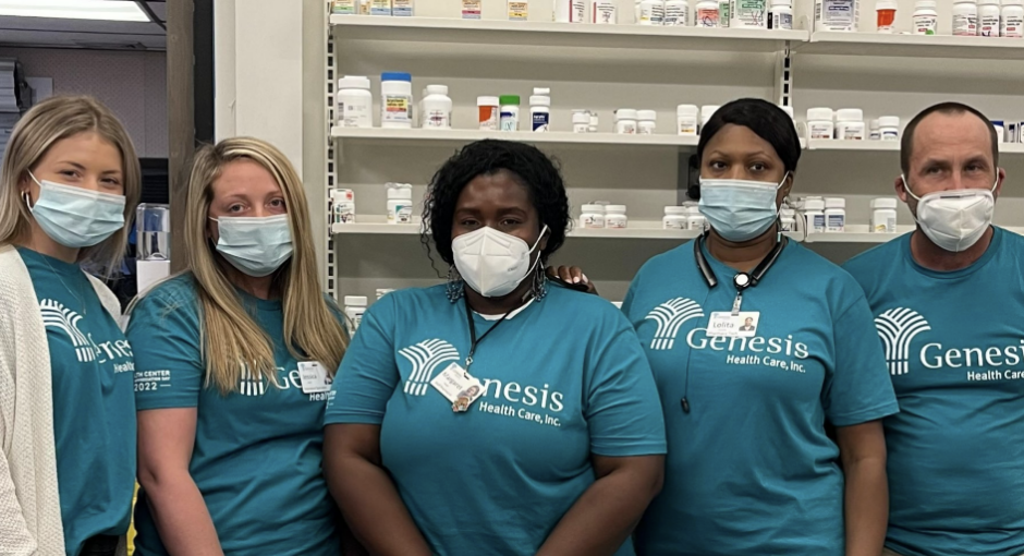 Genesis health care pharmacy workers wearing face masks