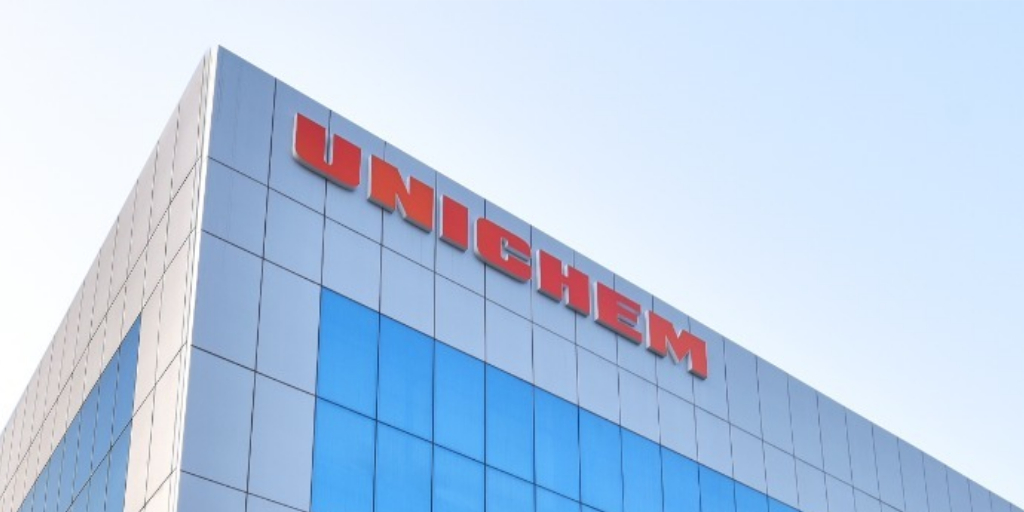 Drug manufacturer Unichem wordmark on building