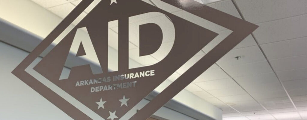 Arkansas Insurance Department interior office sign