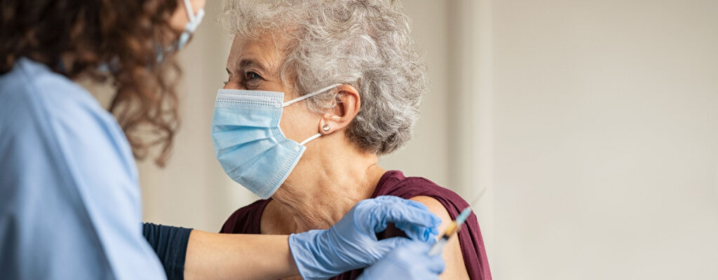 Elderly patient receives a Covid vaccination
