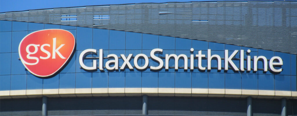 GlaxoSmithKline wordmark and GSK logo on a building